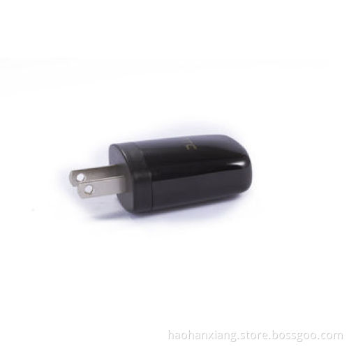 US travel/home charger with 1,000mA, available in black